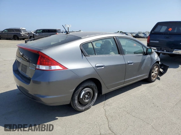 2010 Honda Insight EX with VIN JHMZE2H7XAS021268, listed as a Copart auction lot 54179245 with 211,561 mi miles and Salvage Title. Bid and sale history available at DreamBid. Image 3.