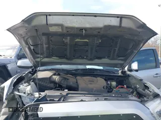 2018 Toyota Tacoma SR5 with VIN 5TFAZ5CN6JX057889, listed as a IAAI auction lot 41449604 with 114,888 mi miles and . Bid and sale history available at DreamBid. Image 10.
