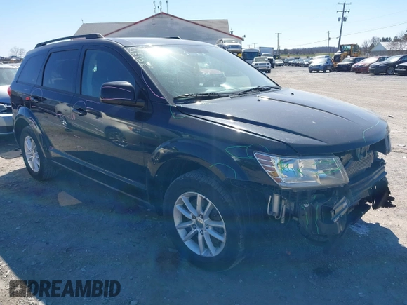 2016 Dodge Journey SXT with VIN 3C4PDCBGXGT123087, listed as a IAAI auction lot 41869667 with 256,583 mi miles. Bid and sale history available at carsss.com. Image 1.