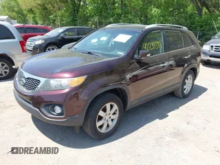 2012 Kia Sorento LX with VIN 5XYKT4A27CG195861, listed as a IAAI auction lot 42241593 with 175,282 mi miles and . Bid and sale history available at carsss.com. Image 2.