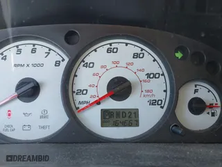 2004 Ford Escape XLT with VIN 1FMCU03184DA00828, listed as a IAAI auction lot 42021621 with 164,667 mi miles. Bid and sale history available at carsss.com. Image 7.