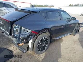 2023 Kia EV6 Wind z VIN KNDC34LA9P5127293, wystawiony jako IAAI lot #41711613 z przebiegiem 12 365 mil mil oraz . Historia ofert i sprzedaży dostępna na DreamBid. Obrazek 4.