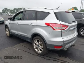 2014 Ford Escape Titanium с VIN 1FMCU0J98EUC28001, выставлен на аукционе IAAI как лот 42442784 с пробегом 163 159 миль миль и . История ставок и продаж доступна на DreamBid. Изображение 3.
