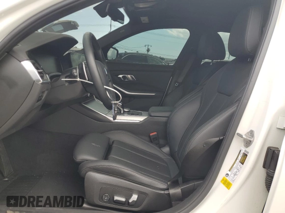 2022 BMW 3 Series 330i with VIN 3MW5R1J08N8C23042, listed as a Copart auction lot 56992485 with 43,693 mi miles and Salvage title. Bid and sale history available at DreamBid. Image 7.