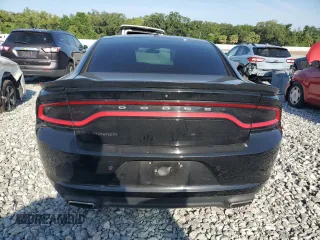 2019 Dodge Charger SXT with VIN 2C3CDXBG1KH697184, listed as a Copart auction lot 54313085 with 108,518 mi miles and Clean Title. Bid and sale history available at carsss.com. Image 6.