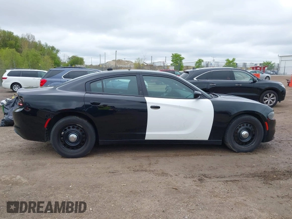 2018 Dodge Charger Police with VIN 2C3CDXKT4JH323762, listed as a IAAI auction lot 42184867 with 107,575 mi miles and . Bid and sale history available at carsss.com. Image 14.