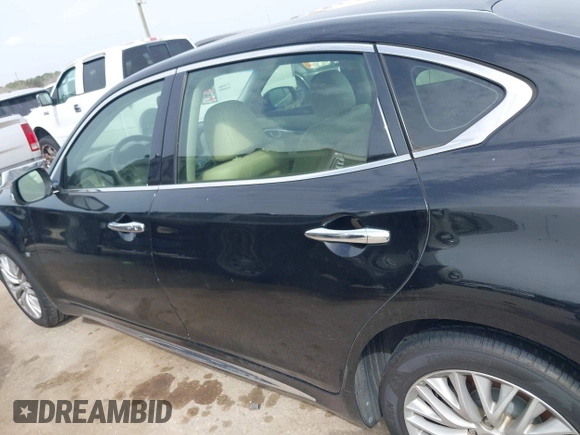 2015 Infiniti Q70 with VIN JN1BY1PP9FM601468, listed as a IAAI auction lot 41745618 with 138,932 mi miles and . Bid and sale history available at DreamBid. Image 14.