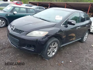 2009 Mazda CX-7 Sport with VIN JM3ER293490233789, listed as a IAAI auction lot 41853327 with 213,164 mi miles. Bid and sale history available at carsss.com. Image 2.
