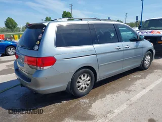 2010 Honda Odyssey EX with VIN 5FNRL3H44AB059711, listed as a IAAI auction lot 42057760 with 225,486 mi miles and . Bid and sale history available at DreamBid. Image 4.