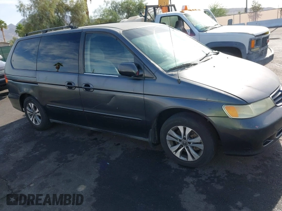 2002 Honda Odyssey EX with VIN 2HKRL18632H512158, listed as a IAAI auction lot 42354621 with 240,373 mi miles and . Bid and sale history available at DreamBid. Image 6.