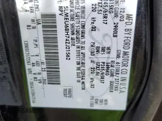 2004 Lincoln Aviator Luxury z VIN 5LMEU68H74ZJ21562, wystawiony jako Copart lot #49727035 z przebiegiem 267 399 mil mil oraz Szkoda całkowita • Salvage title. Historia ofert i sprzedaży dostępna na DreamBid. Obrazek 13.