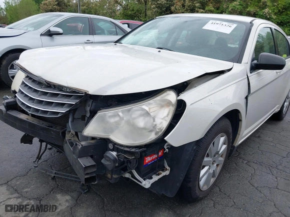 2010 Chrysler Sebring Touring with VIN 1C3CC4FB5AN229593, listed as a IAAI auction lot 41971326 with 144,561 mi miles. Bid and sale history available at carsss.com. Image 6.