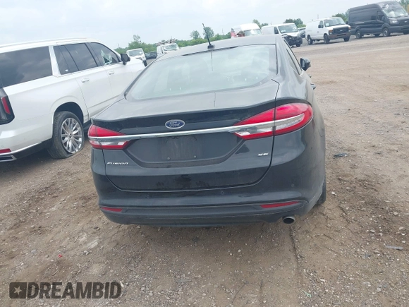 2017 Ford Fusion SE z VIN 3FA6P0H73HR283356, wystawiony jako IAAI lot #42416078 z przebiegiem 52 337 mil mil oraz . Historia ofert i sprzedaży dostępna na DreamBid. Obrazek 16.