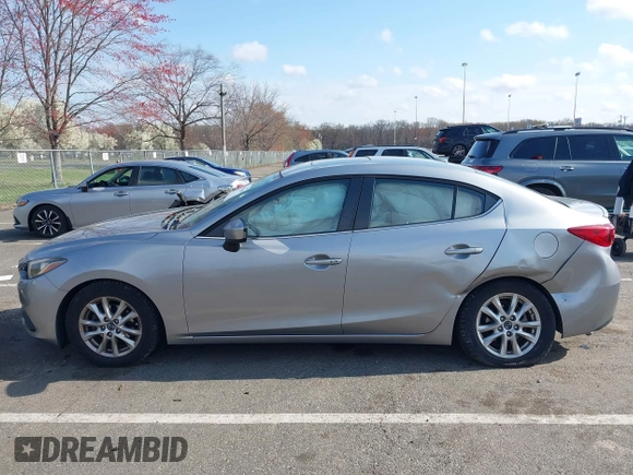 2014 Mazda 3 i Grand Touring with VIN JM1BM1W72E1196080, listed as a IAAI auction lot 42002800 with 88,772 mi miles. Bid and sale history available at carsss.com. Image 14.