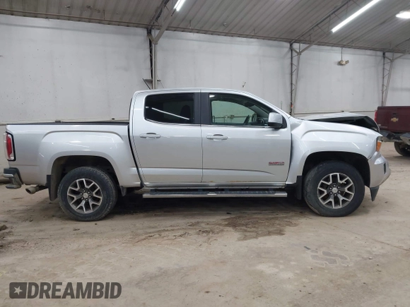 2015 GMC Canyon 4WD SLE z VIN 1GTG6BE39F1252926, wystawiony jako IAAI lot #42128396 z przebiegiem 113 139 mil mil oraz . Historia ofert i sprzedaży dostępna na DreamBid. Obrazek 13.