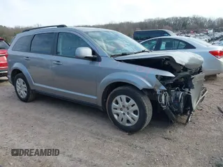 2019 Dodge Journey SE with VIN 3C4PDCBB0KT719211, listed as a IAAI auction lot 41823499 with 151,569 mi miles and . Bid and sale history available at DreamBid. Image 1.
