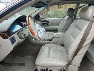 2002 Cadillac Eldorado z VIN 1G6EL12Y82B102243, wystawiony jako Copart lot #72717014 z przebiegiem 165 442 mil mil oraz Czysty tytuł • Clean title. Historia ofert i sprzedaży dostępna na DreamBid. Obrazek 7.
