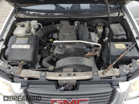 2005 GMC Envoy SLT with VIN 1GKDS13S452258553, listed as a Copart auction lot 82888944 with 174,546 mi miles and Salvage Title. Bid and sale history available at carsss.com. Image 12.