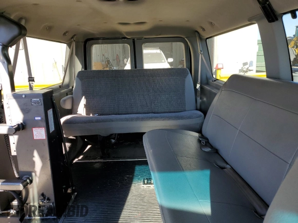 2002 Ford Econoline Passenger XL with VIN 1FMRE11LX2HB04681, listed as a Copart auction lot 60885454 with 114,665 mi miles and Salvage title. Bid and sale history available at DreamBid. Image 10.