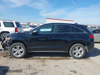 2015 Acura RDX Tech Pkg with VIN 5J8TB3H54FL010757, listed as a IAAI auction lot 41557233 with 108,935 mi miles. Bid and sale history available at carsss.com. Image 14.