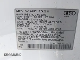 2014 Audi Q7 Premium Plus with VIN WA1LGAFE3ED021002, listed as a IAAI auction lot 42769562 with 82,118 mi miles and . Bid and sale history available at DreamBid. Image 9.