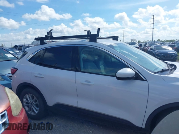 2020 Ford Escape SE z VIN 1FMCU0G68LUB44710, wystawiony jako IAAI lot #42545274 z przebiegiem Nie podano mil oraz . Historia ofert i sprzedaży dostępna na DreamBid. Obrazek 14.