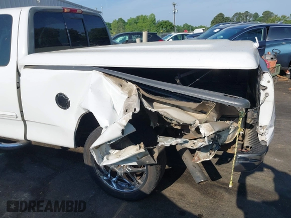 2000 Ford F-150 XL with VIN 1FTRX17L7YNB73649, listed as a IAAI auction lot 42159021 with Not provided miles and . Bid and sale history available at DreamBid. Image 6.