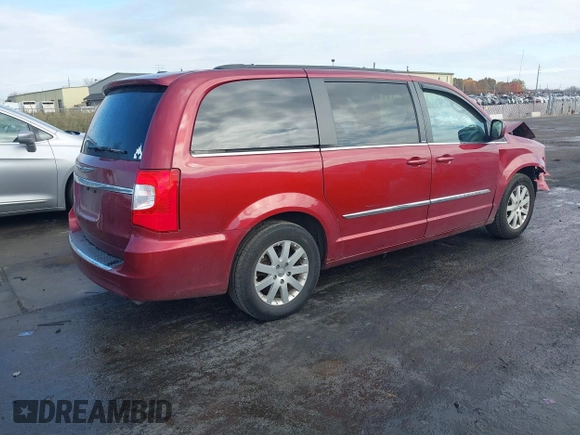 2013 Chrysler Town & Country Touring with VIN 2C4RC1BG0DR634631, listed as a IAAI auction lot 40686174 with 143,206 mi miles. Bid and sale history available at carsss.com. Image 4.