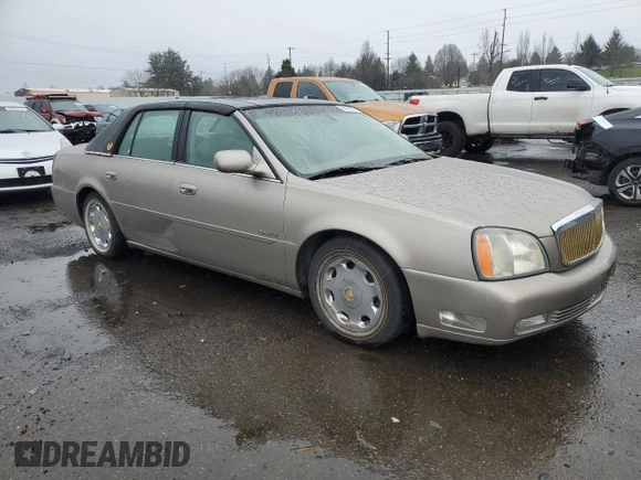 2004 Cadillac DeVille DTS z VIN 1G6KF57944U117834, wystawiony jako Copart lot #89320975 z przebiegiem 149 820 mil mil oraz Szkody całkowita. Historia ofert i sprzedaży dostępna na DreamBid. Obrazek 4.