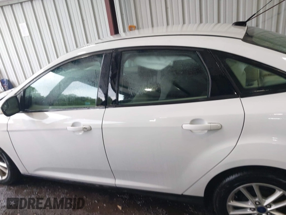2016 Ford Focus SE с VIN 1FADP3F22GL211156, выставлен на аукционе IAAI как лот 42502613 с пробегом 121 224 миль миль и . История ставок и продаж доступна на DreamBid. Изображение 14.