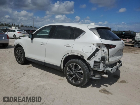2023 Mazda CX-5 S Premium with VIN JM3KFBDM6P0146078, listed as a Copart auction lot 55654665 with 13,645 mi miles and Salvage Title. Bid and sale history available at DreamBid. Image 2.