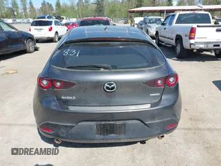 2022 Mazda Mazda3 Hatchback Premium with VIN JM1BPAML9N1518186, listed as a IAAI auction lot 42074112 with 23,722 mi miles. Bid and sale history available at carsss.com. Image 16.