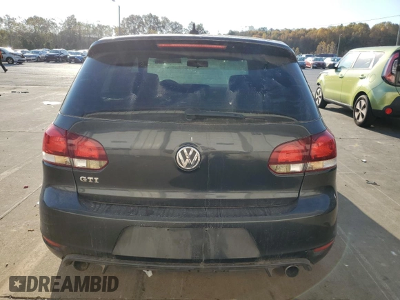 2010 Volkswagen GTI w/Sunroof with VIN WVWEV7AJ9AW329267, listed as a Copart auction lot 77848994 with 0 mi miles and Salvage Title. Bid and sale history available at carsss.com. Image 6.