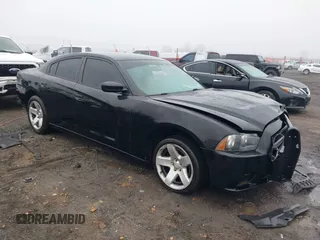 2014 Dodge Charger Police z VIN 2C3CDXAT0EH241700, wystawiony jako IAAI lot #41441494 z przebiegiem 148 642 mil mil oraz . Historia ofert i sprzedaży dostępna na DreamBid. Obrazek 1.