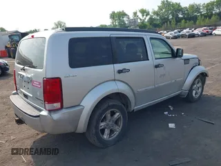2010 Dodge Nitro SXT z VIN 1D4PU5GK8AW146087, wystawiony jako IAAI lot #42423104 z przebiegiem 220 381 mil mil oraz . Historia ofert i sprzedaży dostępna na DreamBid. Obrazek 4.