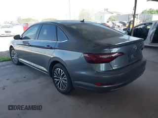 2021 Volkswagen Jetta S z VIN 3VWC57BU0MM028310, wystawiony jako IAAI lot #41938979 z przebiegiem 61 056 mil mil oraz . Historia ofert i sprzedaży dostępna na DreamBid. Obrazek 3.