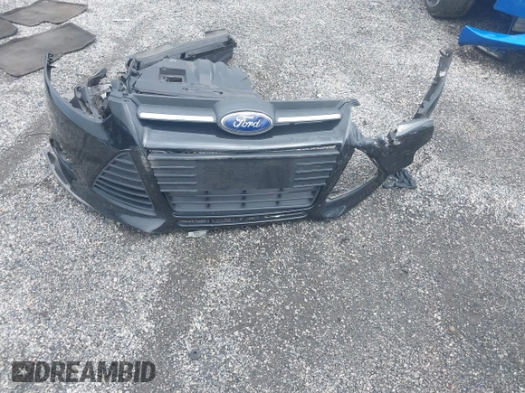 2013 Ford Focus SE with VIN 1FADP3F2XDL260259, listed as a IAAI auction lot 42460604 with 152,626 mi miles and . Bid and sale history available at DreamBid. Image 12.