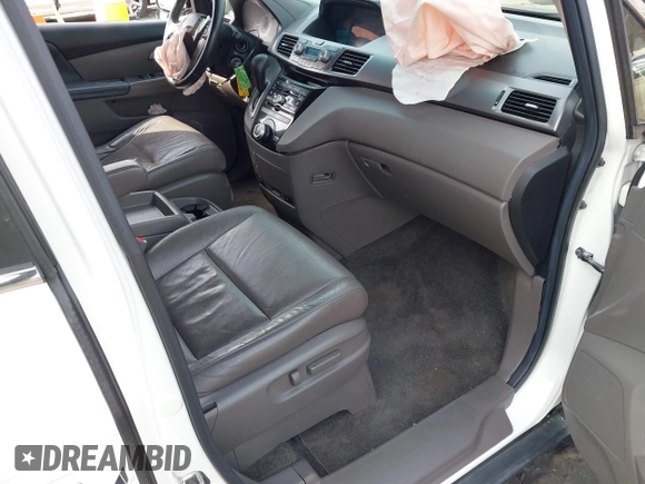 2011 Honda Odyssey EX-L with VIN 5FNRL5H67BB070541, listed as a IAAI auction lot 41812554 with 150,898 mi miles and . Bid and sale history available at DreamBid. Image 5.