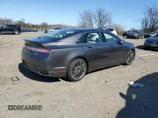 2015 Lincoln MKZ z VIN 3LN6L2JK1FR604092, wystawiony jako Copart lot #48379525 z przebiegiem 64 656 mil mil oraz Szkoda całkowita • Salvage title. Historia ofert i sprzedaży dostępna na DreamBid. Obrazek 3.