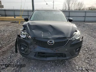 2014 Mazda CX-5 Touring with VIN JM3KE2CY9E0375990, listed as a Copart auction lot 50875165 with 166,574 mi miles and Salvage Title. Bid and sale history available at carsss.com. Image 5.