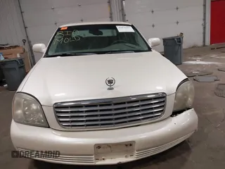 2003 Cadillac DeVille with VIN 1G6KD54Y63U178022, listed as a IAAI auction lot 42076667 with 141,863 mi miles. Bid and sale history available at carsss.com. Image 12.