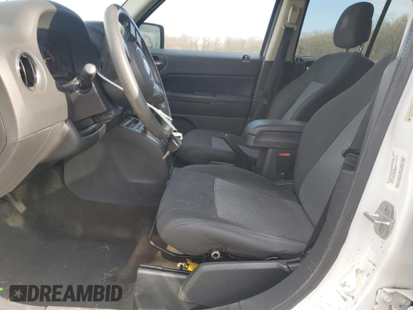 2014 Jeep Patriot Sport with VIN 1C4NJRBB2ED507410, listed as a Copart auction lot 49771915 with 149,883 mi miles and Salvage Title. Bid and sale history available at DreamBid. Image 7.