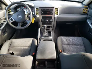 2009 Jeep Grand Cherokee Laredo with VIN 1J8GS48K09C525473, listed as a Copart auction lot 84880384 with 144,419 mi miles and Salvage Title. Bid and sale history available at carsss.com. Image 8.