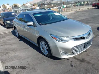 2014 Toyota Avalon Limited with VIN 4T1BK1EBXEU094015, listed as a IAAI auction lot 41415683 with 183,627 mi miles. Bid and sale history available at carsss.com. Image 1.