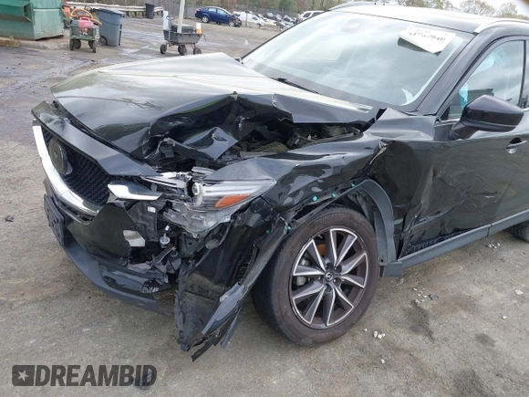 2018 Mazda CX-5 Grand Touring with VIN JM3KFBDM1J0358197, listed as a IAAI auction lot 41967940 with 148,119 mi miles and . Bid and sale history available at DreamBid. Image 6.