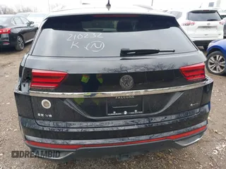 2023 Volkswagen Atlas SE z VIN 1V2HE2CA1PC210232, wystawiony jako IAAI lot #40966039 z przebiegiem 4 064 mil mil oraz . Historia ofert i sprzedaży dostępna na DreamBid. Obrazek 17.