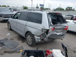 2010 Honda Odyssey EX-L с VIN 5FNRL3H77AB098271, выставлен на аукционе IAAI как лот 42030508 с пробегом 204 474 миль миль и . История ставок и продаж доступна на DreamBid. Изображение 3.