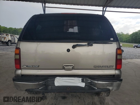 2003 Chevrolet Tahoe LS z VIN 1GNEC13Z53R224384, wystawiony jako Copart lot #54262975 z przebiegiem 244 322 mil mil oraz Szkoda całkowita • Salvage title. Historia ofert i sprzedaży dostępna na DreamBid. Obrazek 6.