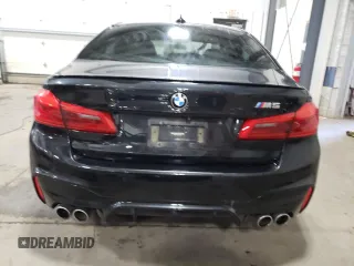 2019 BMW M5 Competition z VIN WBSJF0C56KB447913, wystawiony jako Copart lot #39548993 z przebiegiem 30 141 mil mil oraz . Historia ofert i sprzedaży dostępna na DreamBid. Obrazek 6.