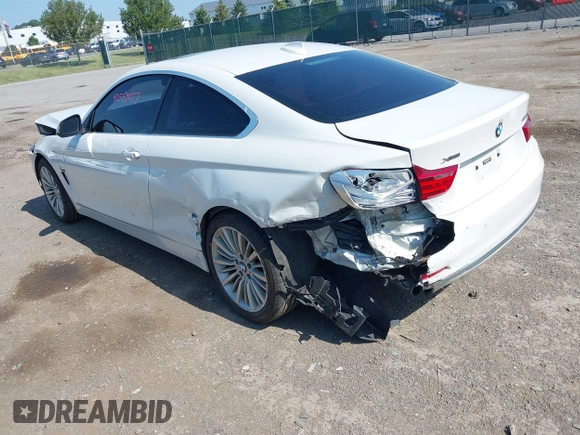 2015 BMW 4 Series 428i xDrive with VIN WBA3N5C52FK484864, listed as a IAAI auction lot 42569077 with 95,431 mi miles and . Bid and sale history available at DreamBid. Image 3.